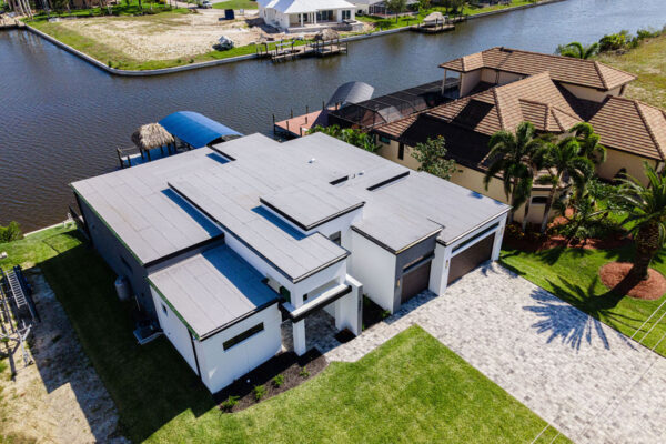 Top View Home Building Setup with Lake: Construction Services In Cape Coral, FL | Pascal Construction Inc.