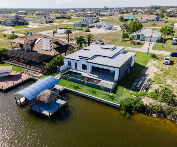 Top View Home Building Setup with Lake: Construction Services In Cape Coral, FL | Pascal Construction Inc.