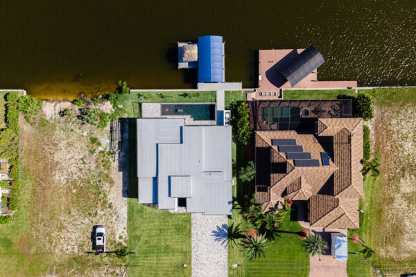Top View Home Building Setup with Lake: Construction Services In Cape Coral, FL | Pascal Construction Inc.